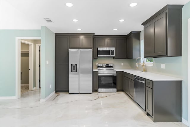 kitchen featuring stainless steel appliances and sink