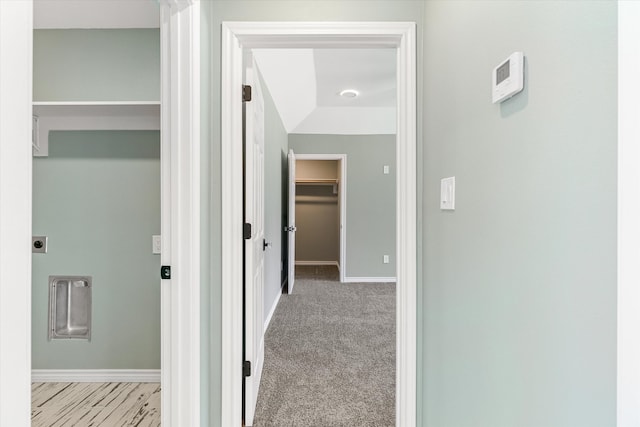 hallway with light carpet