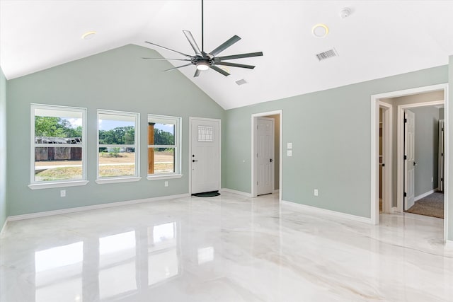 unfurnished living room featuring high vaulted ceiling and ceiling fan