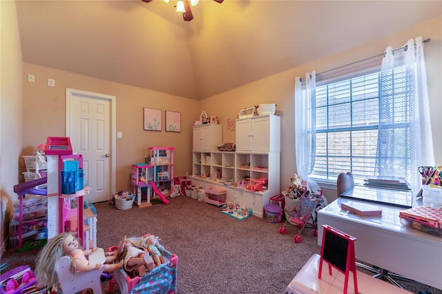 playroom with lofted ceiling, carpet floors, ceiling fan, and a healthy amount of sunlight