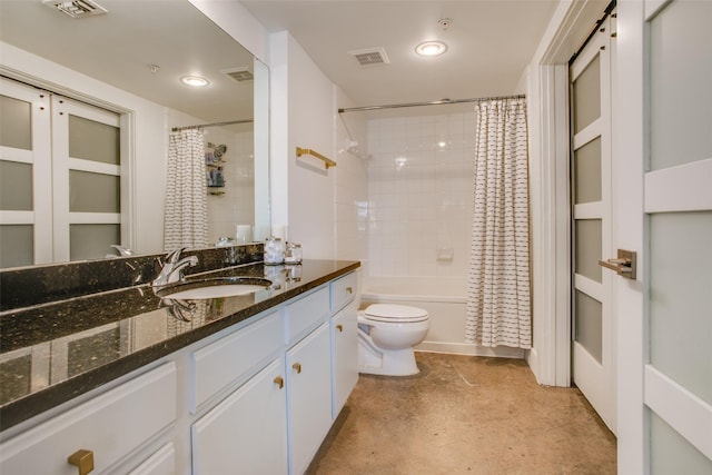 full bathroom featuring shower / bath combination with curtain, vanity, and toilet