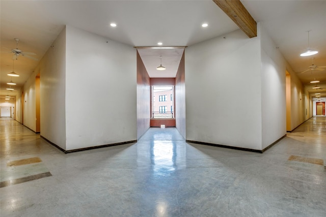 hallway with beamed ceiling