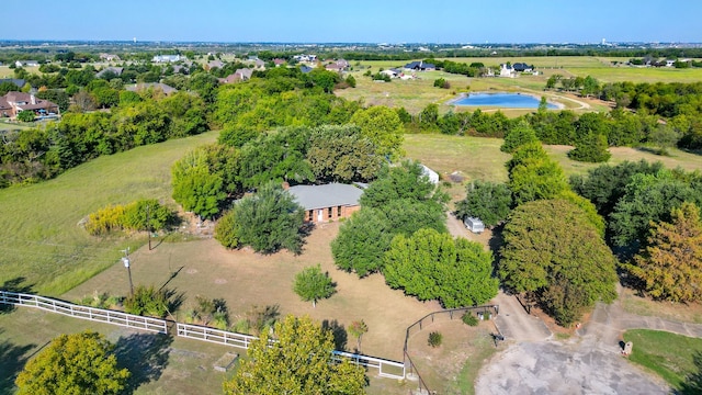 aerial view with a rural view and a water view