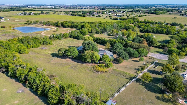 drone / aerial view with a rural view and a water view