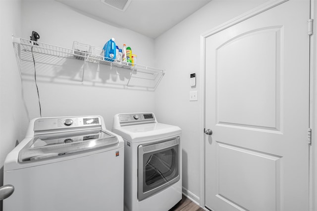 laundry room featuring independent washer and dryer