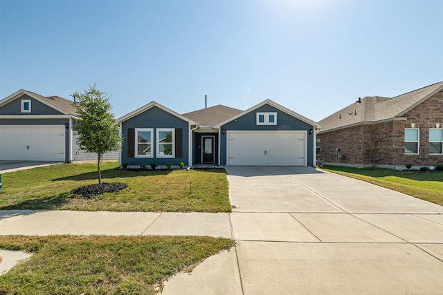 ranch-style house with a garage and a front lawn