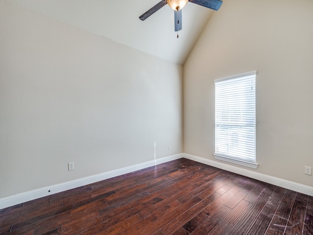 empty room with dark hardwood / wood-style floors, high vaulted ceiling, and ceiling fan