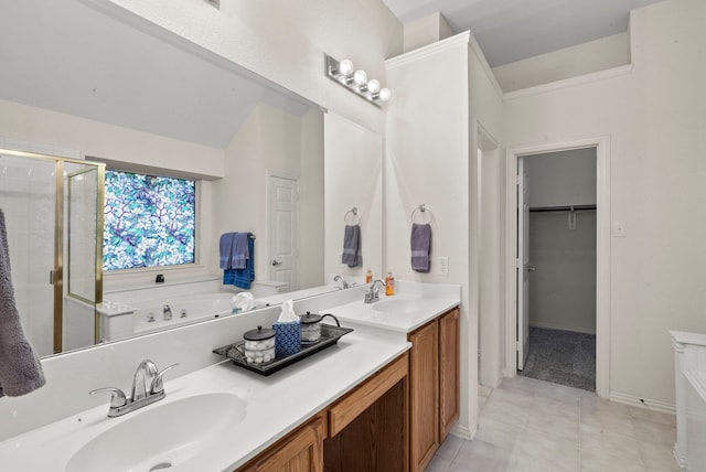 bathroom featuring tile patterned floors, vanity, and independent shower and bath