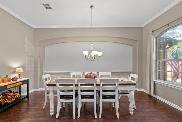 dining space featuring crown molding, plenty of natural light, and dark wood-type flooring