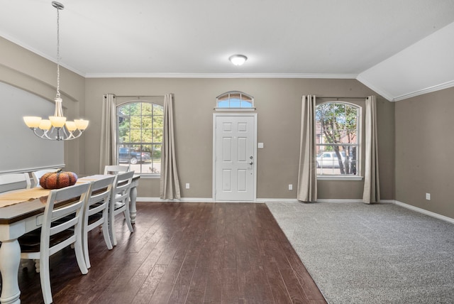 dining room featuring lofted ceiling, a notable chandelier, crown molding, and dark hardwood / wood-style flooring