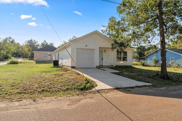 ranch-style house featuring cooling unit, a front yard, and a garage