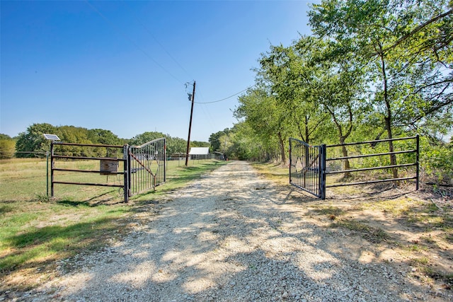 view of road with a rural view