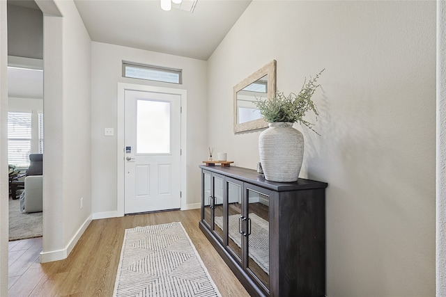 entrance foyer with light wood-type flooring