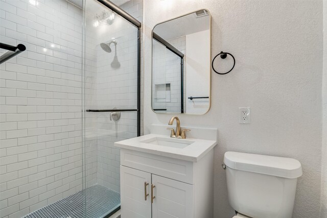4713 San Marcus Dr, Mesquite, TX 75150 - full bathroom with a shower stall, toilet, and vanity