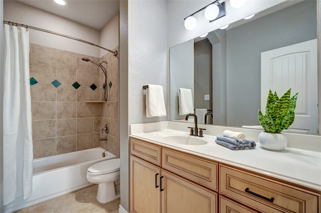 full bathroom with vanity, tile patterned floors, shower / bathtub combination with curtain, and toilet