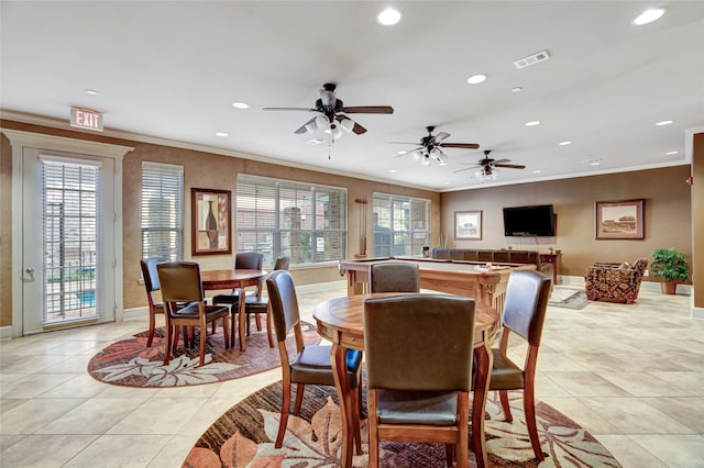 dining area with ceiling fan, light tile patterned floors, and ornamental molding