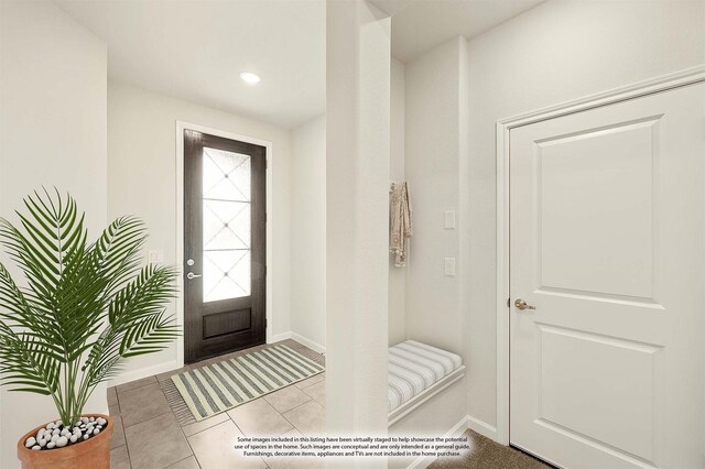 entryway with light hardwood / wood-style flooring