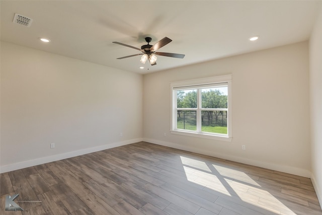 unfurnished room with light hardwood / wood-style floors and ceiling fan