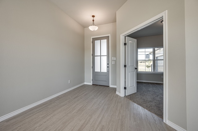 foyer entrance featuring light wood-type flooring