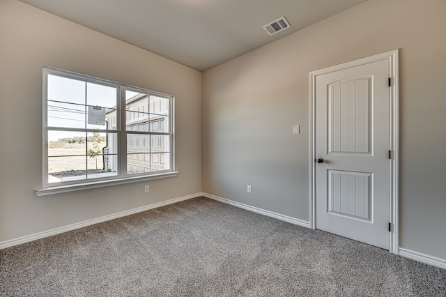 view of carpeted spare room