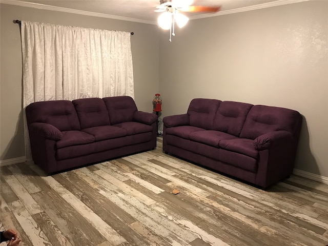 living room featuring ornamental molding, hardwood / wood-style flooring, and ceiling fan