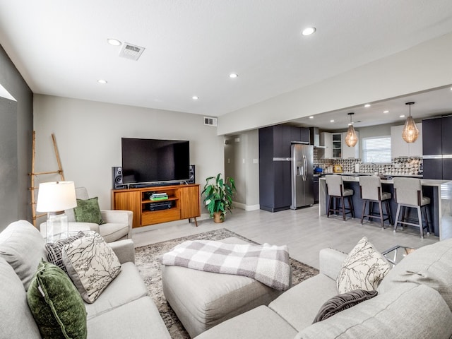 living room with light wood-type flooring