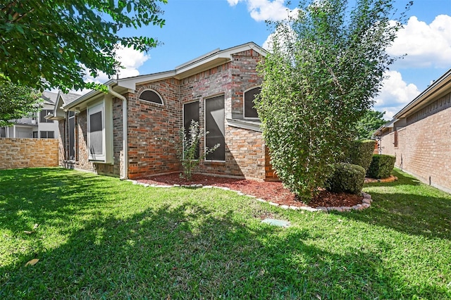 exterior space featuring a lawn