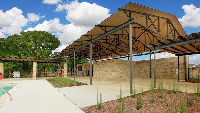 view of patio featuring a community pool