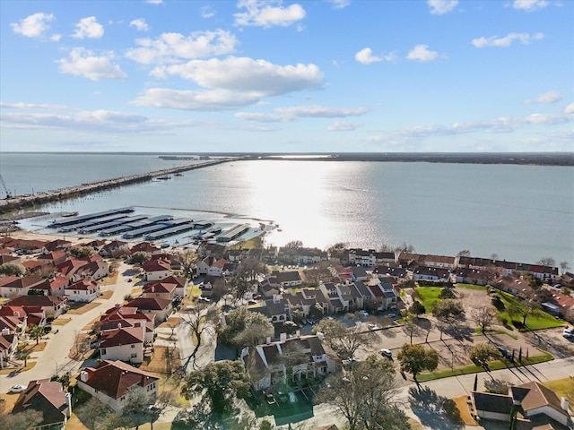 bird's eye view with a residential view and a water view