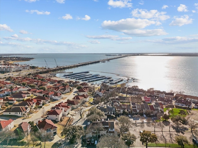 birds eye view of property featuring a water view and a residential view