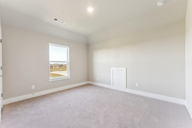 9832 Palermo Dr, Mesquite, TX 75126 - carpeted spare room featuring baseboards, a smoke detector, and vaulted ceiling