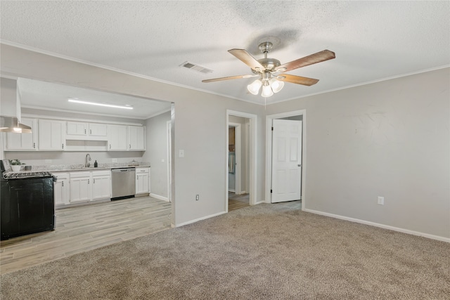 kitchen featuring stainless steel dishwasher, sink, white cabinetry, black range with electric stovetop, and a textured ceiling