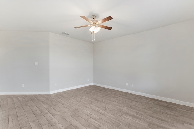 unfurnished room with ceiling fan and light hardwood / wood-style floors