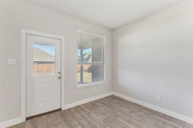 entryway with light hardwood / wood-style flooring