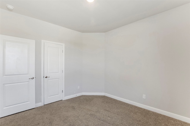 spare room with carpet flooring