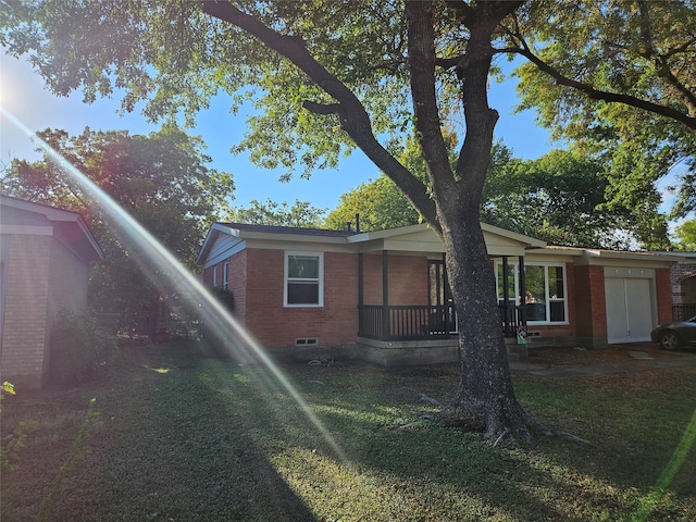 view of side of property with covered porch