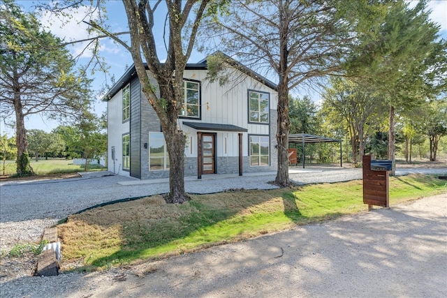 view of side of home with a gazebo