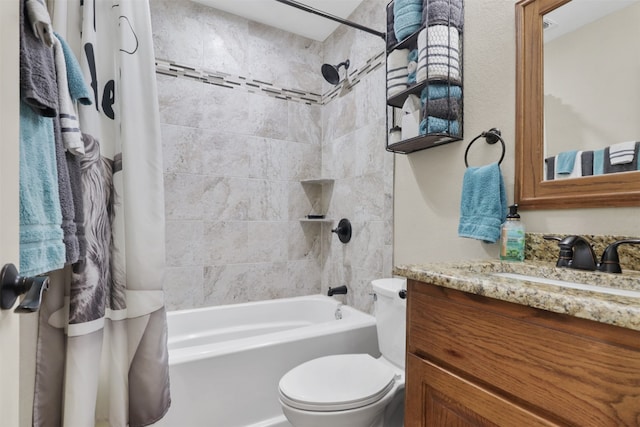 full bathroom featuring shower / bath combination with curtain, vanity, and toilet