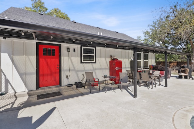 rear view of property with a patio area