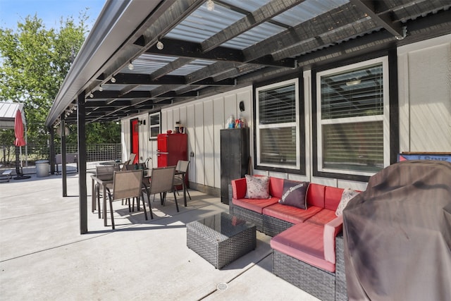 view of patio / terrace featuring an outdoor living space, area for grilling, and a pergola