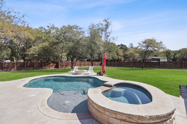 view of swimming pool featuring an in ground hot tub, a patio area, and a lawn