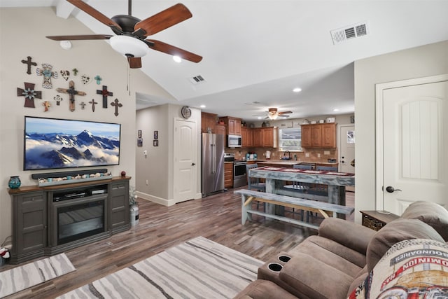 living room with high vaulted ceiling, ceiling fan, sink, and dark hardwood / wood-style floors