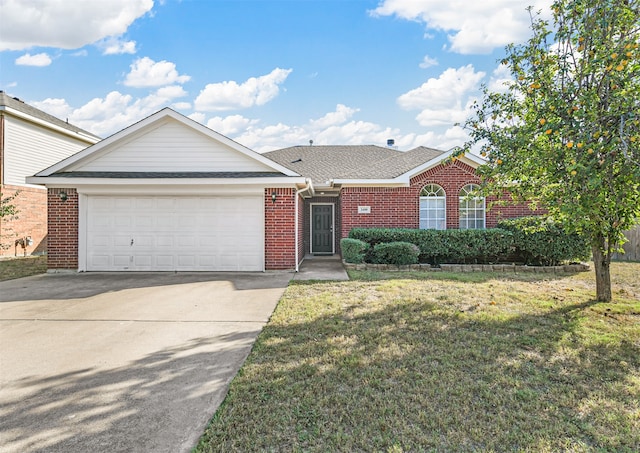 view of front facade with a garage and a front yard