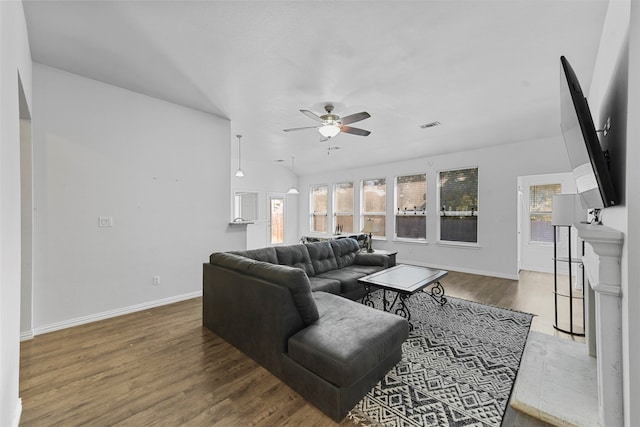 living room with ceiling fan, hardwood / wood-style flooring, and a wealth of natural light