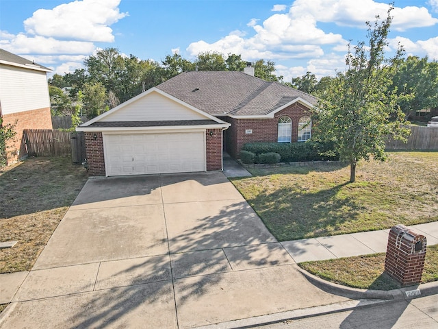 ranch-style home featuring a garage and a front lawn