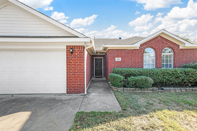 property entrance with a garage