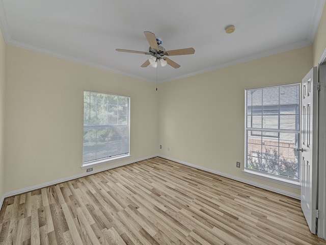 unfurnished room with ceiling fan, crown molding, and light hardwood / wood-style floors