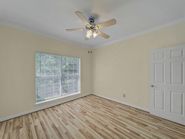 full bathroom featuring tiled shower / bath combo, tile patterned flooring, vanity, toilet, and crown molding