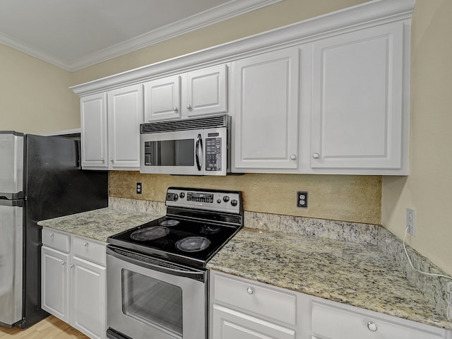 kitchen featuring white cabinetry, light hardwood / wood-style floors, appliances with stainless steel finishes, ornamental molding, and light stone counters