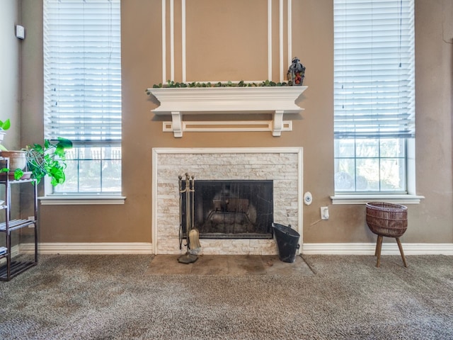 carpeted living room with a fireplace